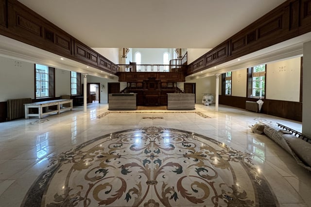 The spectacular main reception room with 15m high ceiling has over 100 square metres of space.