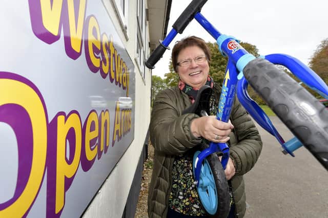 Centre manager Bernie Brown launches the Christmas bike appeal