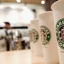 Starbucks coffee cups (Photo by Stephen Chernin/Getty Images)