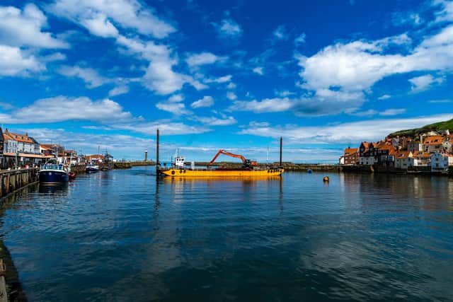 The Whitby dredger 'Sandsend' in the harbour in 2022