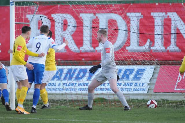 Benn Lewis heads the Seasider in front