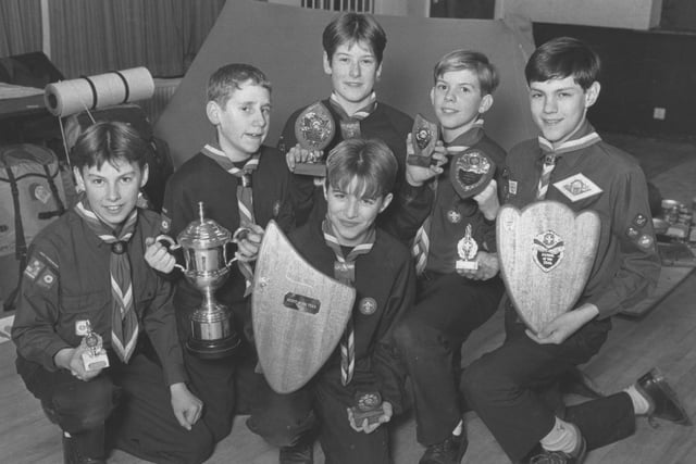 The 1st Scarborough Scouts are pictured with their awards in January, 1992. From left Tom Matusiak and Sam Eade with the football trophy, Matthew Chapman (shooting champion), Richard Smith (Inchipist competition winner), Barry Lowe (Hawkes leader, Patrol of the Year), and Chris Poulter, front (Top Scout of the Year). 