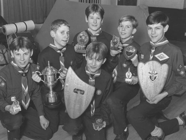 The 1st Scarborough Scouts are pictured with their awards in January, 1992. From left Tom Matusiak and Sam Eade with the football trophy, Matthew Chapman (shooting champion), Richard Smith (Inchipist competition winner), Barry Lowe (Hawkes leader, Patrol of the Year), and Chris Poulter, front (Top Scout of the Year). 