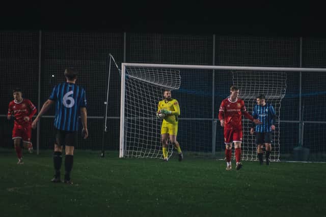 Striker Jake Day played in goal due to a back injury to keeper Alex Baird. Photo by ecmedia