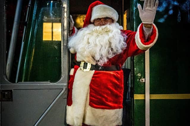 Santa greeting visitors at the Santa Express