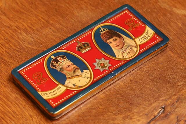 A rare 125-year-old silver chocolate tin made for the coronation of King Edward VII has sold for £1700 at auction. David Duggleby Auctioneers© SWNS