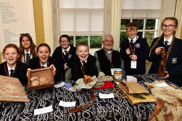 Having a great time - students with Cook Museum volunteer Paul Crooks.
picture: Richard Ponter