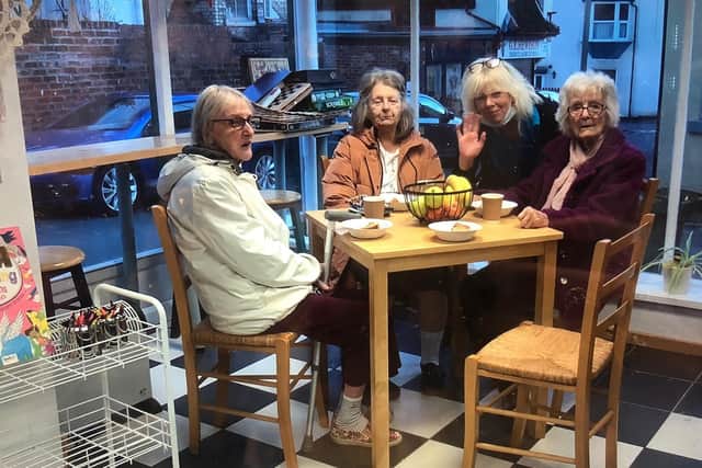 People enjoying a cuppa at Whitby Railway Community Shop.