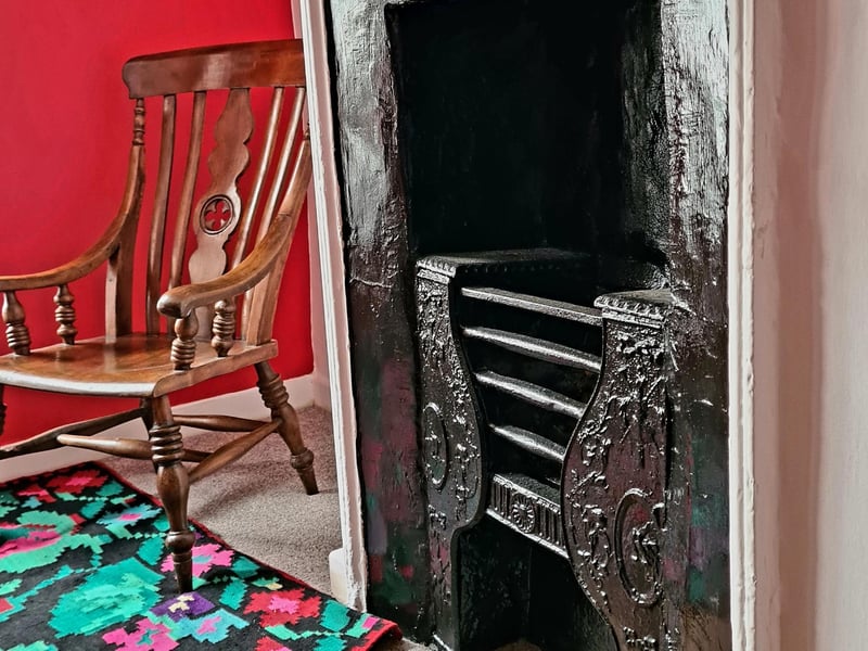 A seat by the fireplace.