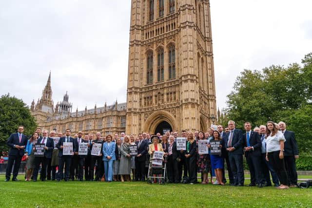 Conservative MPs vote against cuts to the winter fuel payments.
