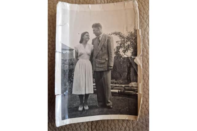 The engagement photo Dennis carried with him