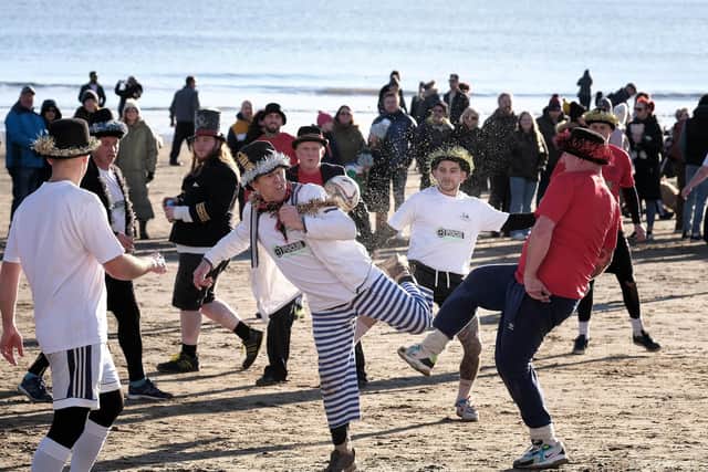 The Fishermen v Firemen football match on Scarborough's South Bay