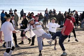 The Fishermen v Firemen football match on Scarborough's South Bay