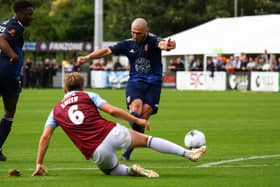 Boro striker Frank Mulhern looks to evade South Shields' Martin Smith.