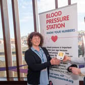 Adele Duffield, outreach librarian, and Andrew Stewart, public health officer, with the new blood pressure monitor in Whitby Library.