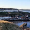 Scenic shot looking across Whitby harbour and out towards Sandsend and Kettleness. picture: Duncan Atkins