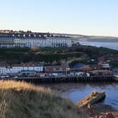 Scenic shot looking across Whitby harbour and out towards Sandsend and Kettleness. picture: Duncan Atkins