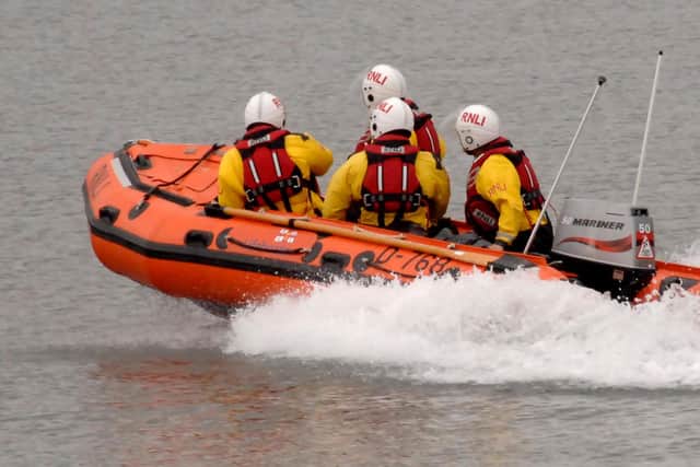 Whitby RNLI's all weather lifeboat used to take poorly fisherman to waiting ambulance.