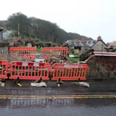 The cemetery wall was badly damaged by a reversing lorry.