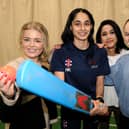 Swedish students meet one of Scarborough College's cricket stars Hana Khan (centre).