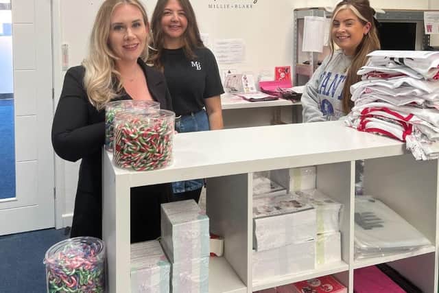 (L to R) Founder Danielle Young with her two team members Amy and Lauren getting ready for the Christmas rush.