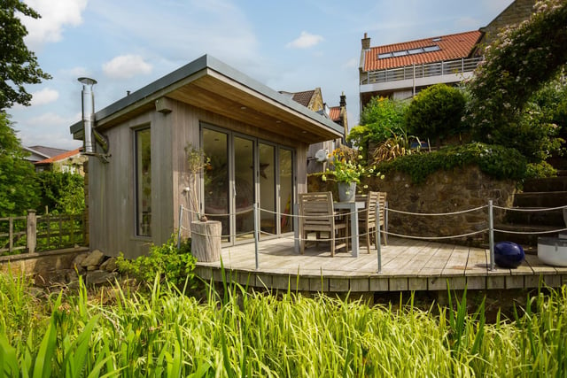 Dine al fresco on one of the decked areas or terraces, or take shelter within this garden room.