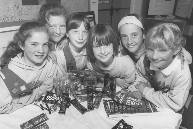 Getting set to raise some funds with their sweet stall in May, 1996, were the 24th Scarborough Brownies, from left, Polly Harford, Sarah Tibbett, Laura Haldenby, Laura Harper, Natasha Johnson, and Charlotte Rank. 