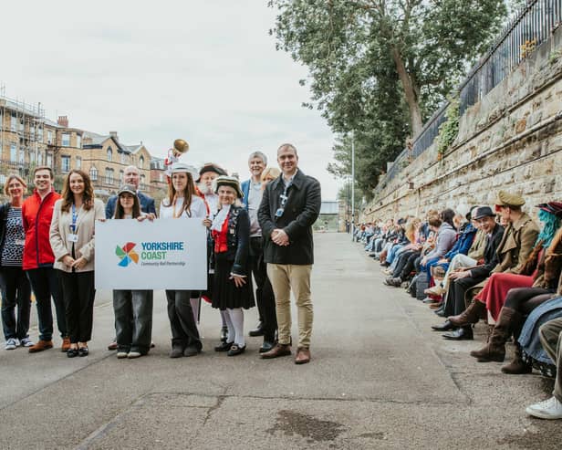 The group brought together 239 people on the world’s longest station seat at Scarborough to mark Railway 200.