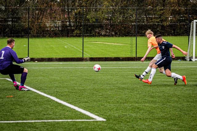 Ted Edwards hits Edgehill's final goal in the 5-0 home win against Linthorpe in the NRCFA Saturday Challenge Cup. PHOTO: ALEC COULSON