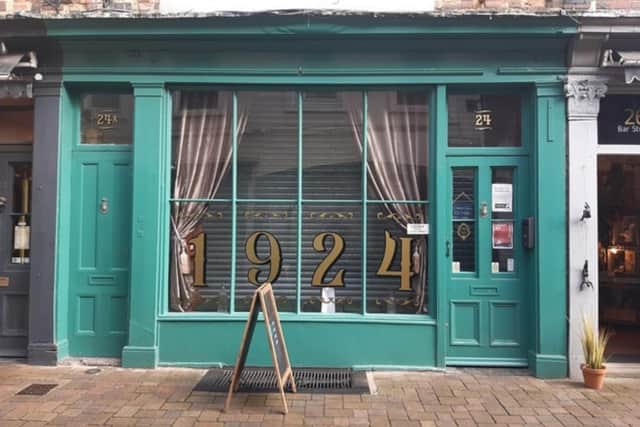 1924 operates as a speakeasy 'hidden' bar, opposite restaurant 1925 - previously known as The Green Room of Bar Street.