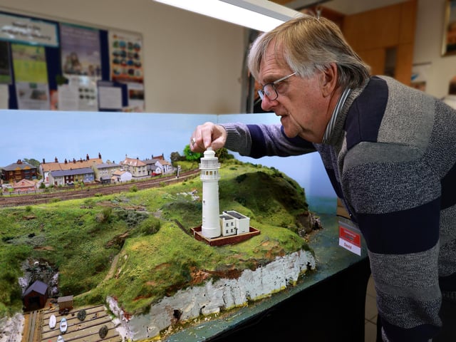 Secretary David Harrison preparing The Flamborough exhibit.