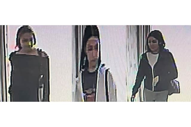 Police have released images of three people they would like to speak to in connection with the theft