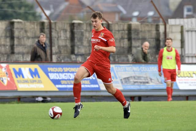 Bridlington Town, red kit, in action during their 1-0 home loss against Trafford FC in the FA Trophy. PHOTOS BY TCF PHOTOGRAPHY