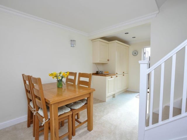 An alternative view of the kitchen with diner.