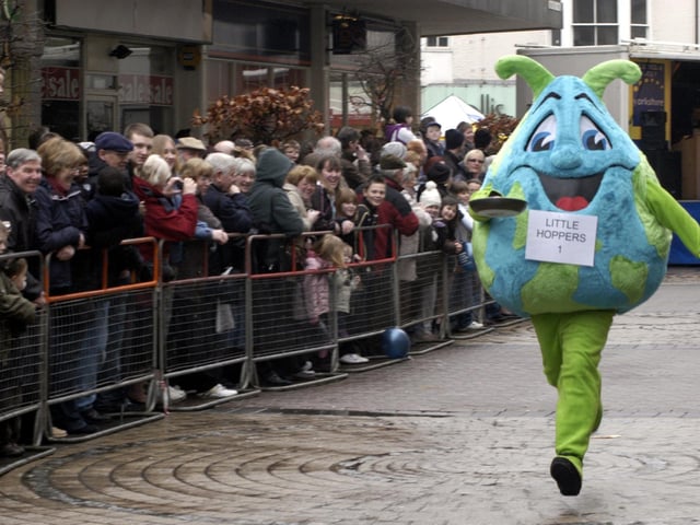 A fancy dress runner from Little Hoppers races on pancake day.