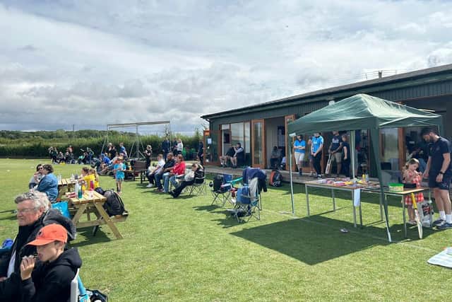 Fans take in the action at the Yapham CC Women & Girls Softball Cricket Festival.