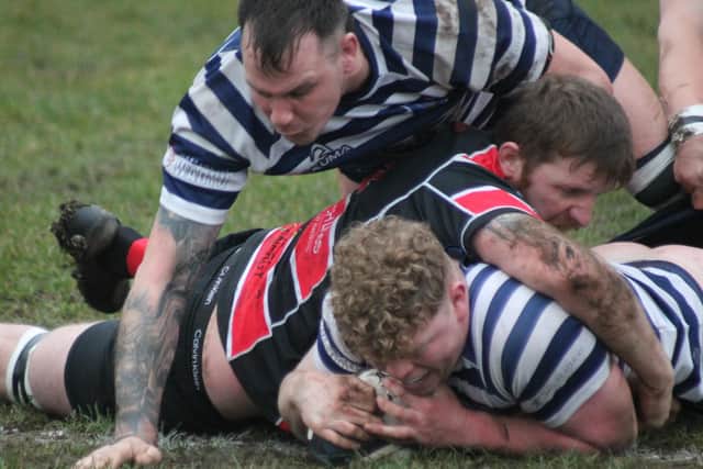 Will Husband plunges over to open the scoring for Pocklington RUFC in the win against Hullensians on Saturday. Photo Phil Gilbank.