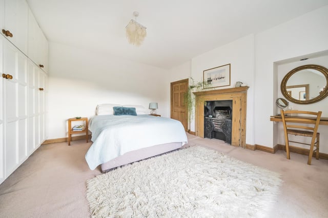 One of three double bedrooms with feature fireplaces within the farmhouse.