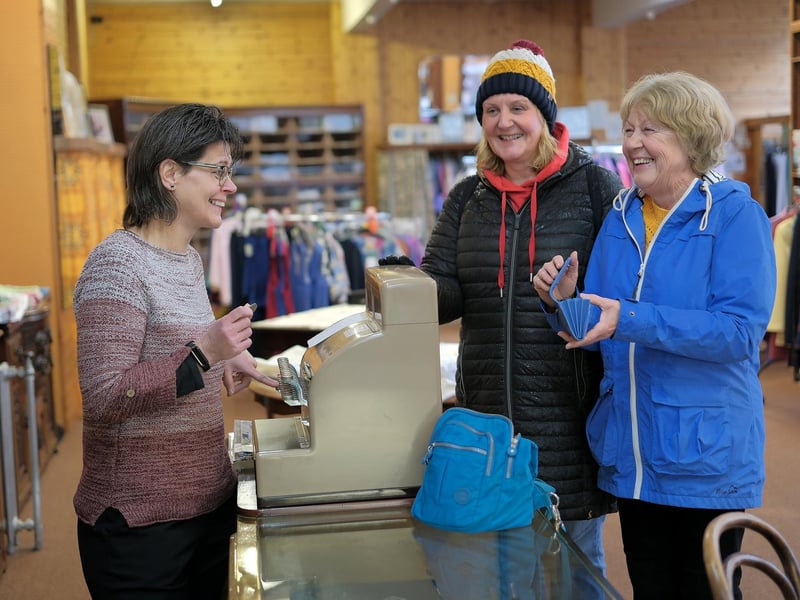 Sue Walker in action serving customers.