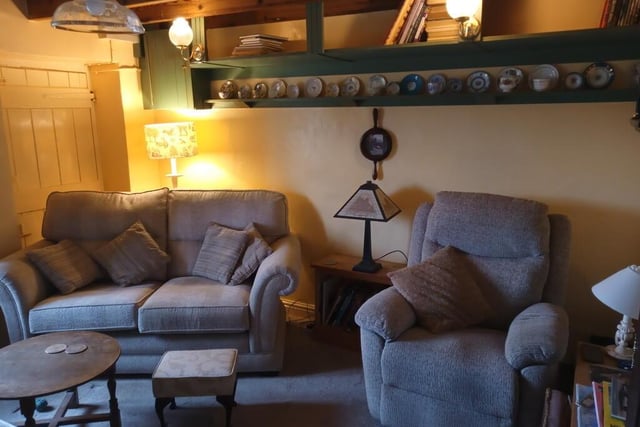 The cosy beamed interior of the cottage.