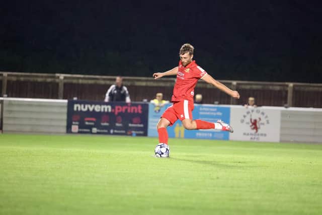 Tom Allan scores the winning penalty for Bridlington Town in the shoot out at Garforth in the FA Trophy. Photo by EC Media