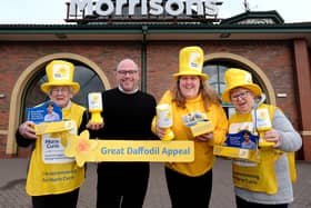 Marie Curie raising money at Morrisons as part of the Great Daffodil Appeal L-R: Joyce Ashton, Morrisons Manager Shane Mullviell, Amelia Forrest and Rosie Pither