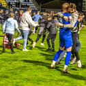 Jubilation for Whitby Town players and supporters after the club beat Chelmsford to book their place in the FA Cup first round.
picture: Brian Murfield