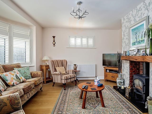 A main feature in the lounge is a gas log burning effect fire.