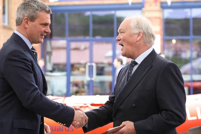 Mark Dowie (right) thanks Whitby Yacht Club commodore Adrian Fusco.
Ceri Oakes / RNLI