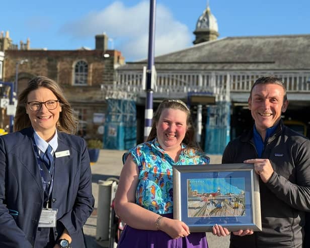 The tapestry handover at Scarborough Train Depot