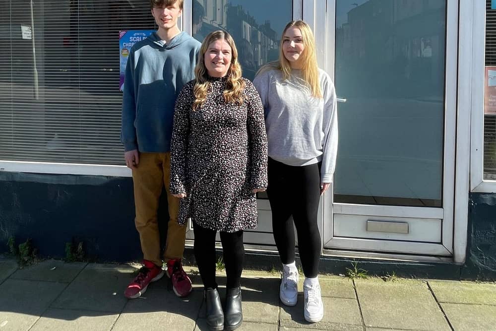 Lucas Hollingsworth, staff member Hannah Bewick & Khya Wigmore.
