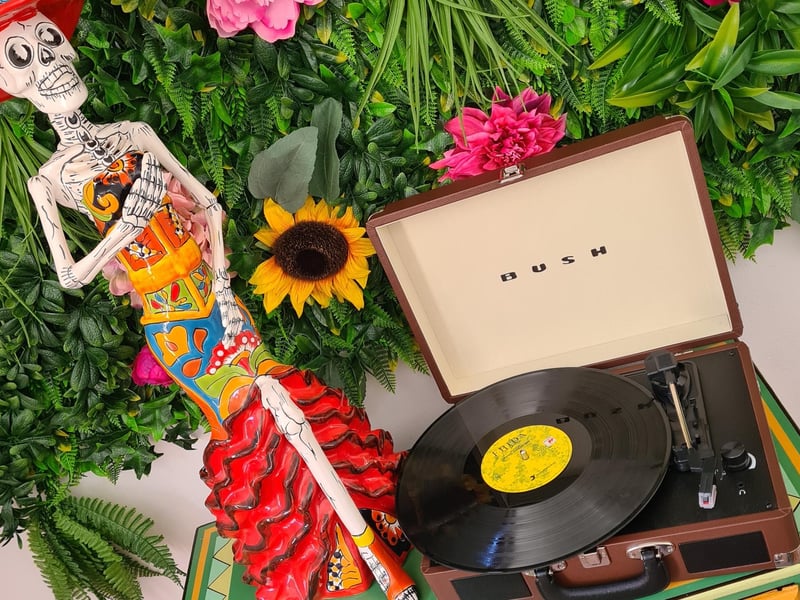 Day of the Dead-type adornment next to the record player.