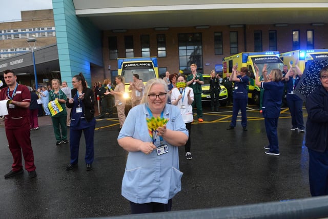 The hard-working staff took to the hospital car park for 8pm, as people around the country clapped on their own doorsteps.