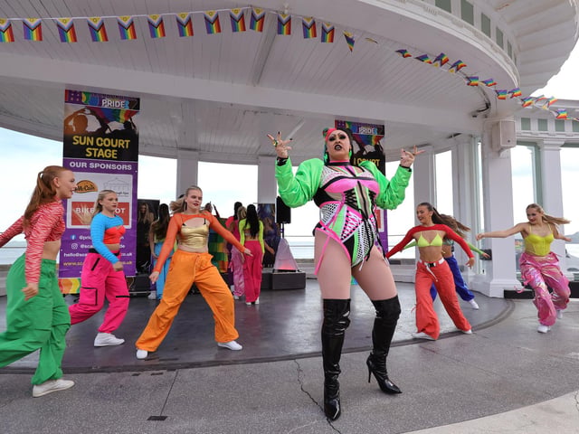 Dancers perform to a captivated audience.